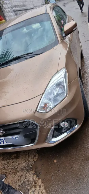 Photo - Suzuki Dzire 2021 Gold