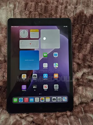 Photo - New Apple iPad 9.7 64 GB Gray