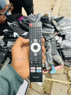 Photo - Syinix Tv Remote for 65 ” Inch