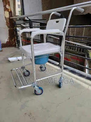 Photo - Toilet Chair判晓commode Chair==٥bathroom Aids: Have the Best