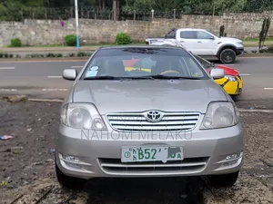 Photo - Toyota Corolla Sedan 2003 Gold