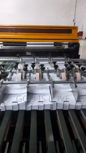 Photo - የወረቀት መቁረጫ Paper Cutting Machine