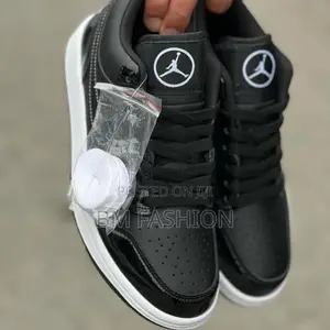 Photo - Air Jordan 1 Low Black and White Patent Leather Casual