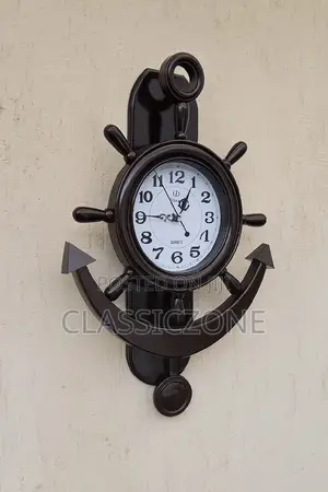 Photo - የግድግዳ ሰዓት ፔንዱለም