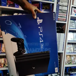 Photo - New Ps4 Pro and 2 Joystick