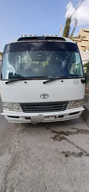 Photo - Toyota Coaster 2013 White