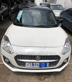 Photo - Suzuki Swift 2021 White