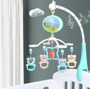 Photo - Baby Bed Bell የልጆች አልጋ መጫዎቻ በባትሪ የሚሰራ በራሱ የሚሽከረከር