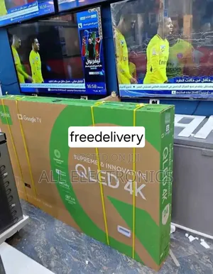 Photo - Syinix 75inch Smart Tv