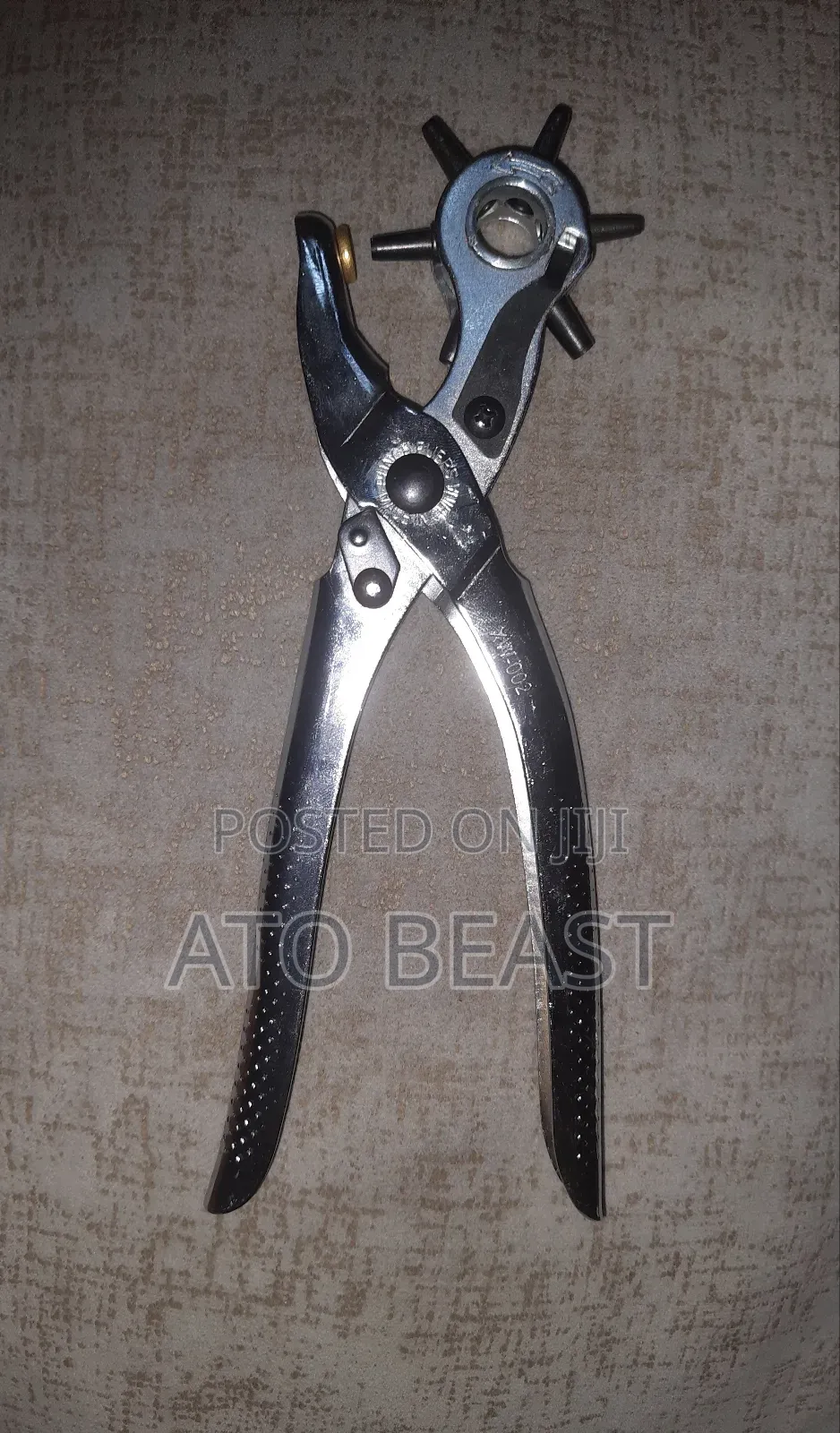 Hole Puncher/ መንጉል