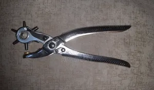 Photo - Hole Puncher/ መንጉል