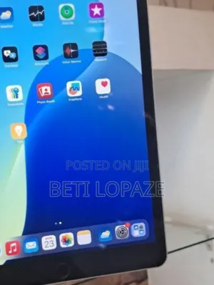 Photo - New Apple iPad 9.7 64 GB Silver