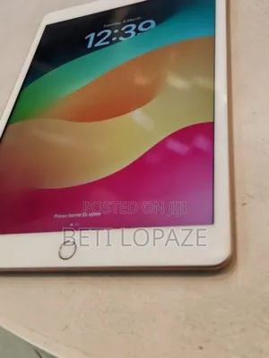 Photo - New Apple iPad Air 128 GB Silver