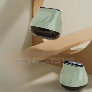 Rechargeable Fabric Shaver, Also Known as a Lint Remover or Defuzzer.
