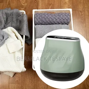 Rechargeable Fabric Shaver, Also Known as a Lint Remover or Defuzzer.