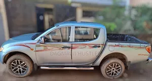 Photo - Mitsubishi L200 Double Cab 2.5 136hp 4WD 2007 Blue