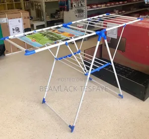 Photo - Foldable Clothes Drying Rack, Sometimes Called a Clothes Airer