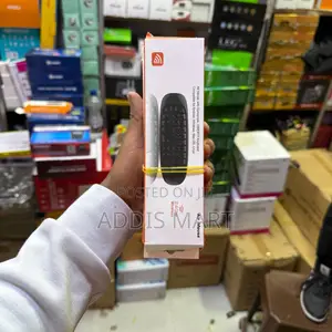 Photo - በcharge የሚሰራ Remote - Mouse እና Keyboard በ1 የያዘ