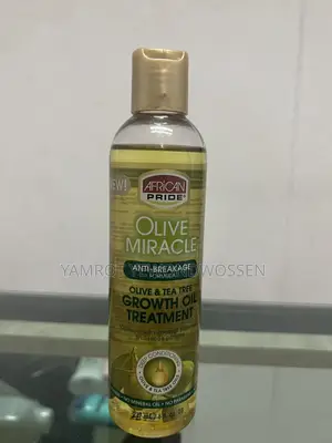 Photo - African Pride Olive and Tea Tree Growth Oil Treatment
