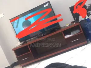 Photo - Woody Tv Stand