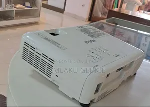 Photo - Epson Projector Brand New 
With Cartoon 
Model Name: Eb-E01