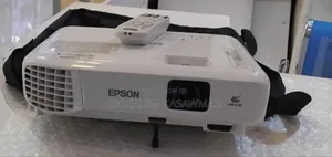 Photo - 1epson Projector Brand New 
With Cartoon 
Model Name: Eb-E