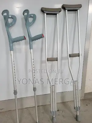 Photo - Crutches吟干axillary Crutches帷፺push Button Adjustability for Ease of Use