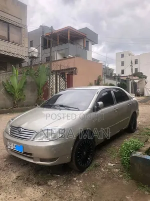 Photo - Toyota Corolla Sedan 2003 Brown