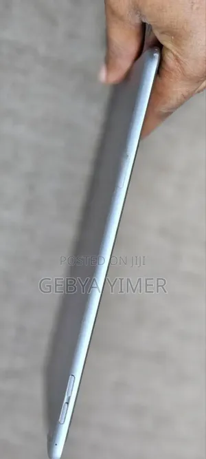 Photo - New Apple iPad mini 4 128 GB Silver