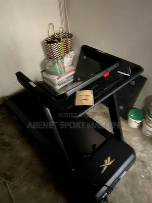 Photo - ዘመናዊ አዲሱ Reebok Fr30 Floatride የመሮጫ ማሽን