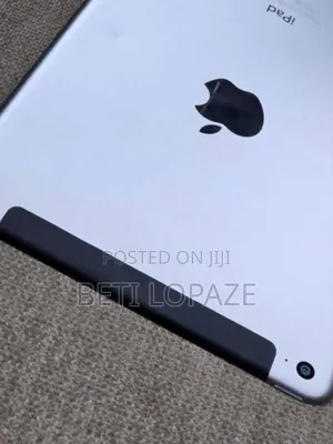 Photo - New Apple iPad mini 4 128 GB White