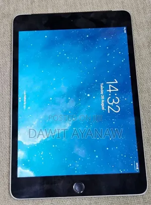 Photo - New Apple iPad mini 4 128 GB Silver