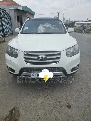 Photo - Hyundai Santa Fe 2013 White