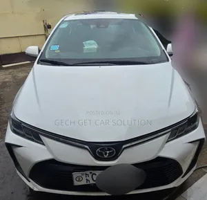 Photo - Toyota Corolla 2023 White