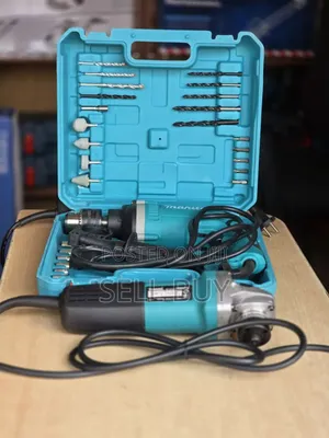 Photo - Makita Drill 710w With Accessories And Makita Grinder 840w