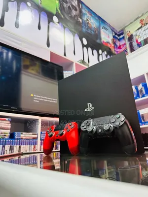 Photo - Playstation 4 Slim Ps4 5 ጌም ይጫንበታል