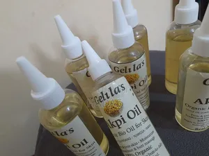 Photo - Akpi Oil Pure and Natural Firms the Breasts and Increases Their Volume