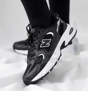 Photo - New Balance Black X White Womens Sneakers