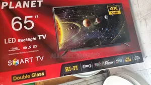 Photo - Planet 65inch Smart Tv