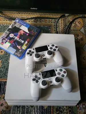 Photo - Ps4 Pro በብዛት አለን Can Ps