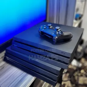 Photo - Playstation 4 በአዲስ እና ያገለገለ