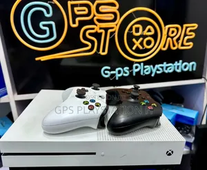 Photo - X Box One S With 2 Controls