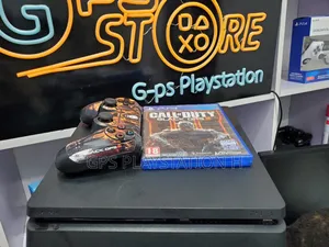 Photo - Playstation 4 Slim Fifa 25,Call of Duty Cd