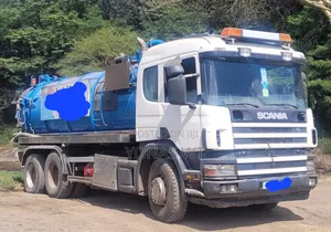 Photo - Scania የሽንት ቤት መጣጭ