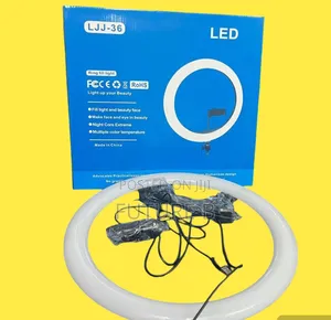 Photo - 14" Led Ring Light: Adjustable Portable Lighting.