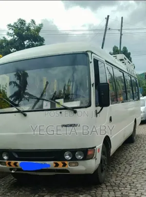 Photo - Toyota Coaster 2022 White