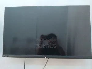 Photo - Synix 32 Inch Tv