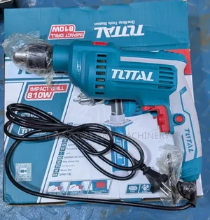 Photo - Total 810 Watt Drill