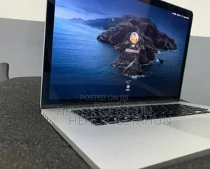 Photo - New Apple MacBook Pro 2023 M2 Pro 14-inch 8GB Intel Core i7 SSD 256GB