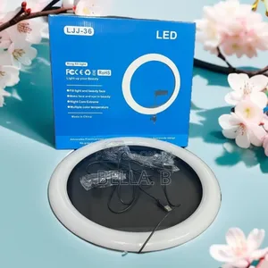Photo - 14 Led Ring Light: Sleek and Modern Design.